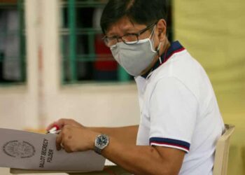 Ferdinand “Bongbong” Marcos, the son and namesake of the late dictator, casts his vote in the 2022 national elections in Ilocos Norte, the Philippines, on 9 May.
