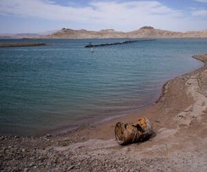 Rusting debris that used to be underwater sits above the water level on Lake Mead.