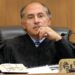 Judge Reyes in court