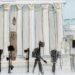 sketch of numerous cameras lined up outside the supreme court