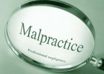 malpractice words and magnifying glass