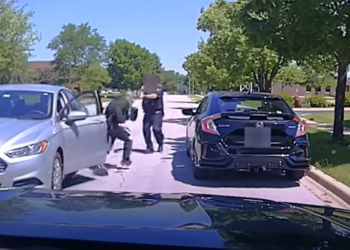 New video shows hatchet-wielding man charging officer before fatal shooting
