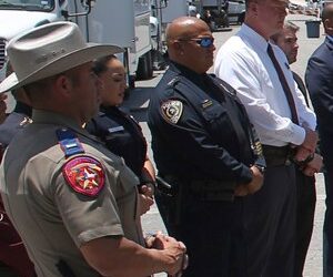 Uvalde School Police Chief Pete Arredondo, third from left, stands during a news conference outside of the Robb Elementary school in Uvalde, Texas Thursday, May 26, 2022.