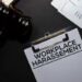 gavel Workplace Harassement text on Document and gavel isolated on office desk. Law concept