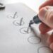 Check off a to-do list with a black pen