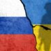 Flag of Russia and Ukraine painted on a concrete wall. Relationship between Ukraine and Russia