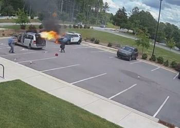 New videos show man throwing Molotov cocktails at cops outside station