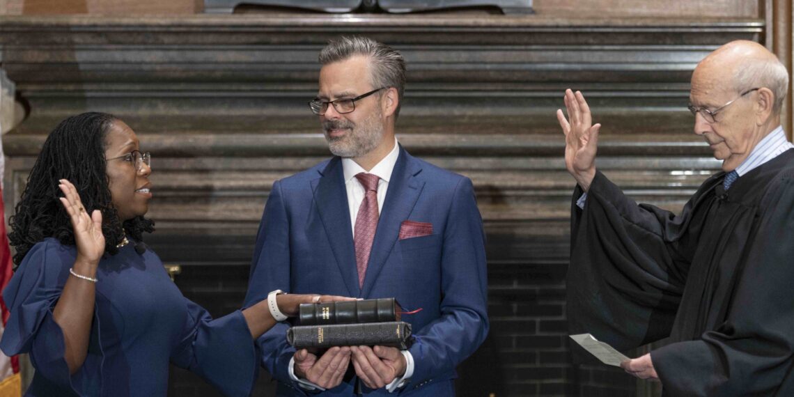 Justice Ketanji Brown Jackson takes the judicial oath from Justice Stephen Breyer