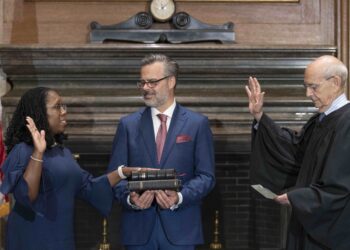 Justice Ketanji Brown Jackson takes the judicial oath from Justice Stephen Breyer