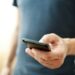 man texting