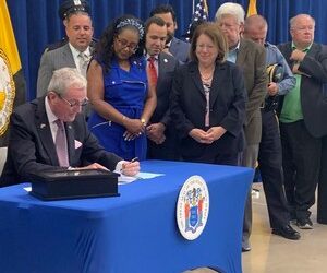 Gov. Phil Murphy signs legislation creating a police licensing system in New Jersey on July 21, 2022.