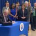 Gov. Phil Murphy signs legislation creating a police licensing system in New Jersey on July 21, 2022.