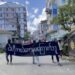 Masked protesters in Yangon.