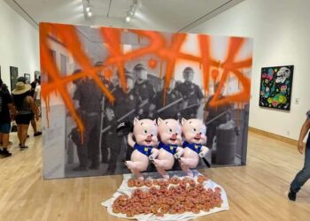 Arts center says it won’t remove pig painting of cops after backlash