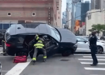 Video shows horrifying moment FDNY firefighter gets leg crushed after SUV tips over at crash scene – Law Officer