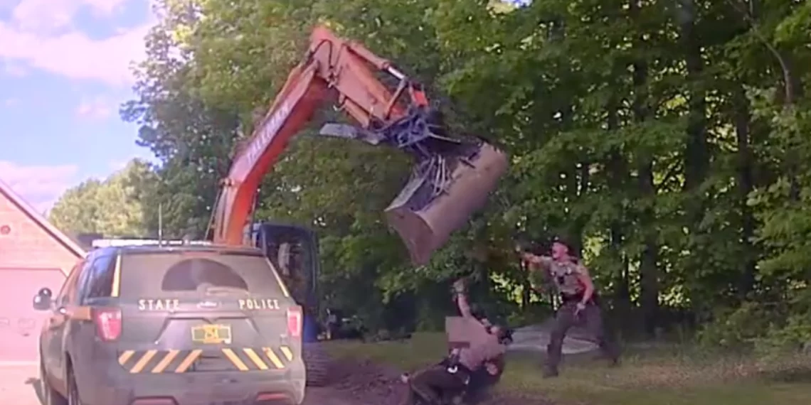 Father accused of swinging excavator at troopers as they arrested his son – Law Officer
