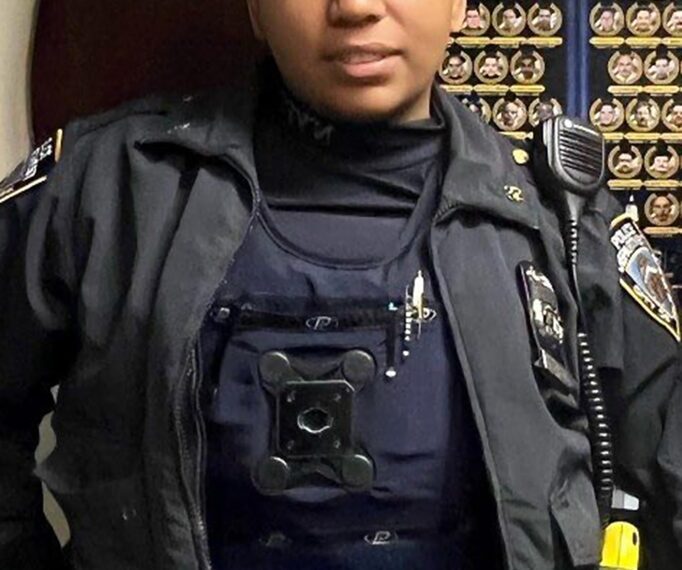 NYPD officer Arianna Gomez stands in uniform.