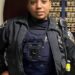 NYPD officer Arianna Gomez stands in uniform.