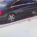 U.S. Postal Inspection Service (USPIS) spokesman Michael Martel showed an image at a press conference of a black Mercedes believed to be the suspect vehicle in an armed robbery on a mail carrier in Northwest Washington, D.C.
