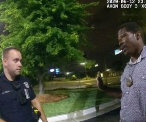 This screen grab taken from body camera video provided by the Atlanta Police Department shows Rayshard Brooks, right, as he speaks with Officer Garrett Rolfe.