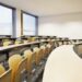 empty classroom Rows of folding chairs and tables