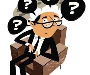 A man sitting in a chair with many questions