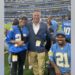 Lt. Randy Sutton, center, the founder of The Wounded Blue, poses with California Highway Patrol officer Juan Reyes, left, and San Bernardino Sheriff's deputy Marcus Mason at SoFi Stadium on Aug. 20, 2022.