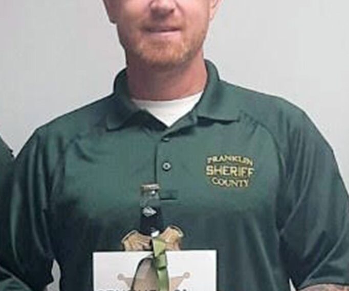 Captain John Grismore was caught on camera kicking the detainee in the crotch and abdomen several times.