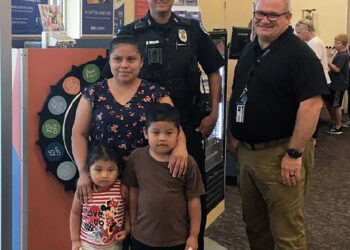 Arkansas police department gives new shoes to students in annual giveaway event
