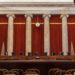 view of empty supreme court bench as seen from back of courtroom