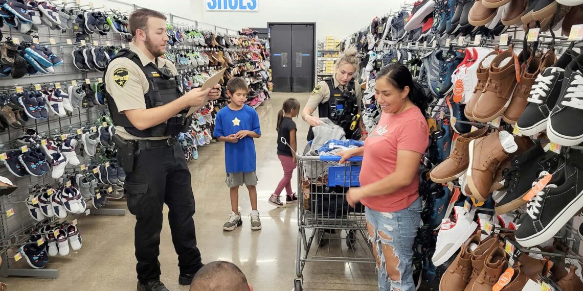 S.D. officers help at-risk youth prepare for new school year with “Shop With a Cop” event