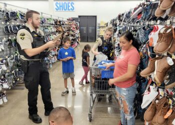 S.D. officers help at-risk youth prepare for new school year with “Shop With a Cop” event