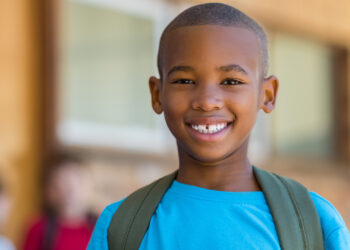 Minnesota Black police officers donate free backpacks and haircuts to kids