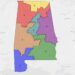 colored map showing Alabama divided into seven districts
