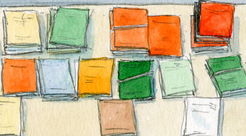 long table full of legal briefs with various colored covers, and masked person on left picks up one of the briefs