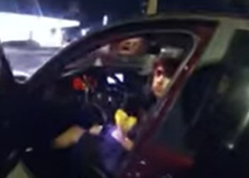 Ex-Texas cop charged over shooting driver eating hamburger in McDonald's parking lot