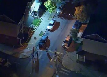 An overhead view of the crime scene in a residential area