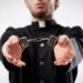Priest handcuffed