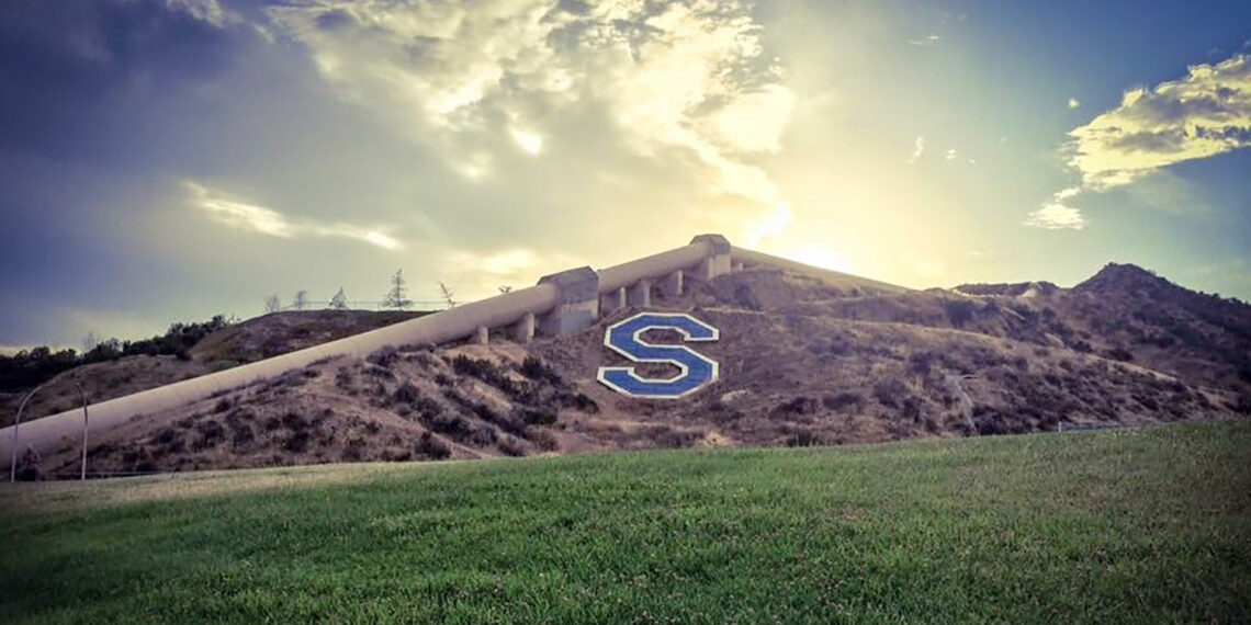 Saugus High School football team banned from carrying thin blue line flag