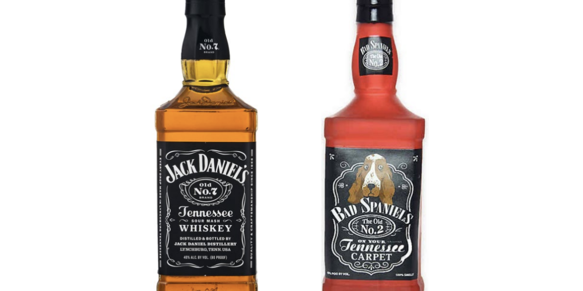side by side comparison of jack daniel's whiskey bottle and similar-looking "Bad Spaniels" dog toy