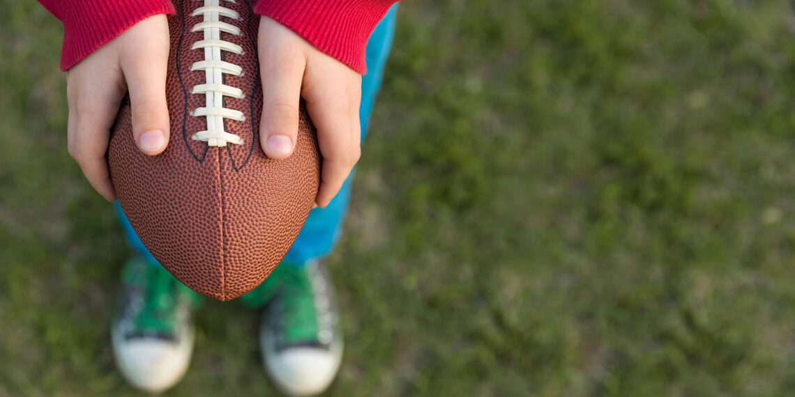 Ohio police officer plays football with local kids after responding to call