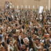 Protestors holding guns chanting something in Yemen