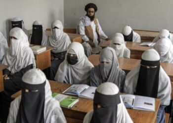 Afghan girls attend a religious school in Kabul, which has remained open since last year’s Taliban takeover, in August 2022.