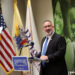 Man speaking at lectern