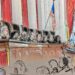 Sketch of woman at the podium conversing with the justices.