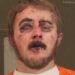 Cassidy Russ was arrested after allegedly throwing a Molotov cocktail at police.