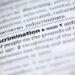 Close up to the dictionary definition of word Discrimination