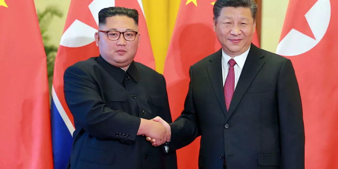 Kim Jong-Un, the Supreme Leader of North Korea shakes hands with Xi Jinping, the President of China.