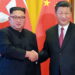 Kim Jong-Un, the Supreme Leader of North Korea shakes hands with Xi Jinping, the President of China.