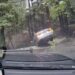 Someone had called 911 to report the car was teetering over a ditch. 